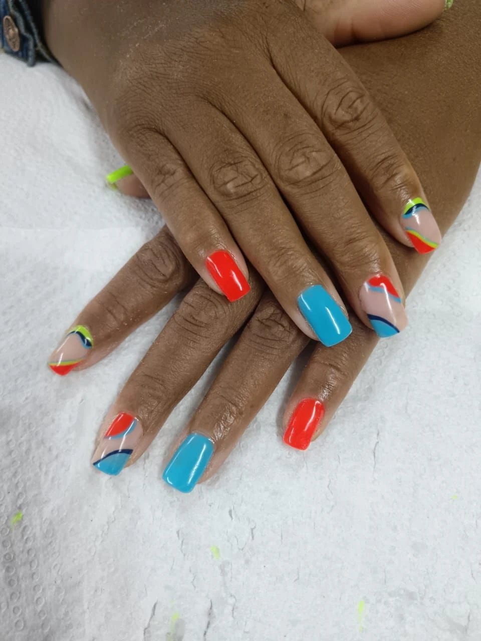 Nails done at Neon Moon Nail & Beauty, Sasolburg: orange and blue colour-block lines