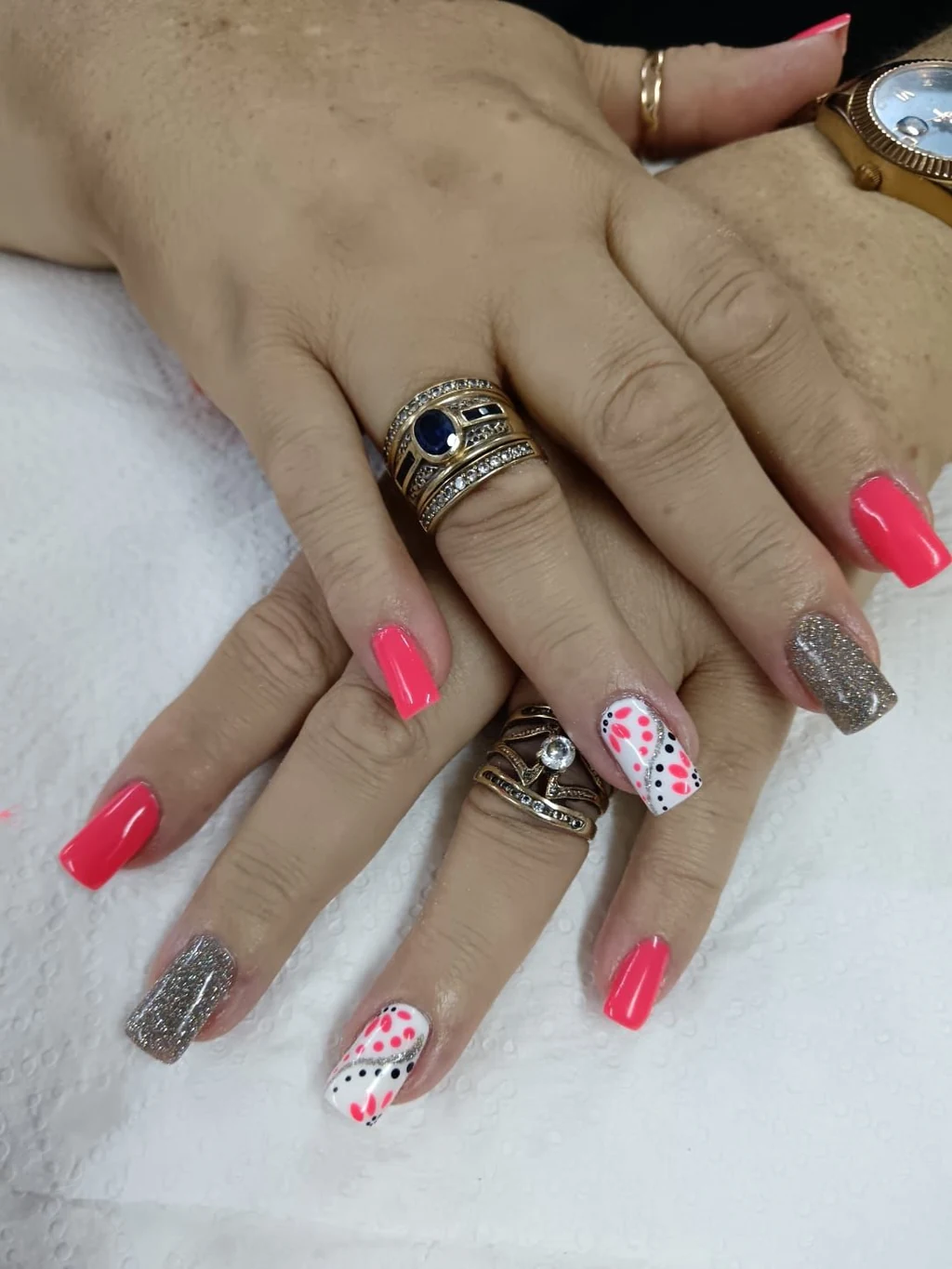 Nails done at Neon Moon Nail & Beauty, Sasolburg: coral with a leopard accent and glitter